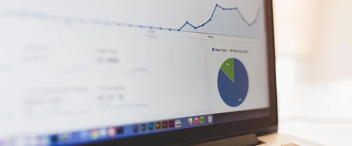 Data dashboards and analytics on screen, the bespoke reconciliation and consolidation builds National Tech Hub delivers