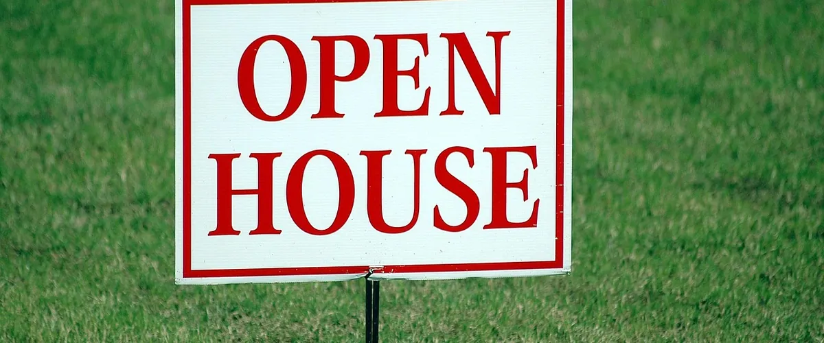 A residential property with a sold board, the kind of estate agency we help with listing and lead automation