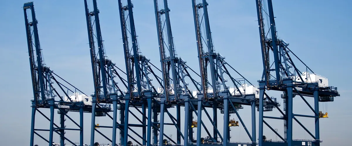 Container cranes at Felixstowe, part of the Suffolk economy National Tech Hub serves with AI and automation