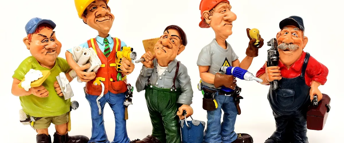 Tradespeople on a construction site, the kind of trade business we help quote and follow up faster